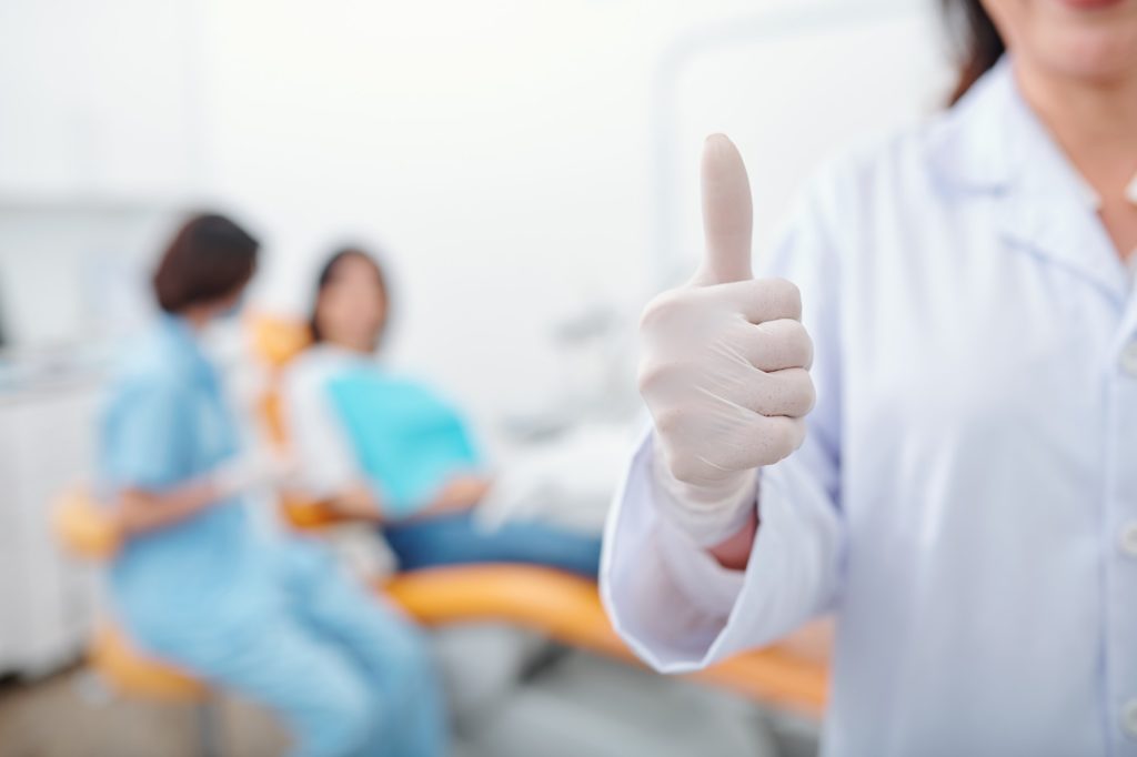 Dentist showing thumbs up