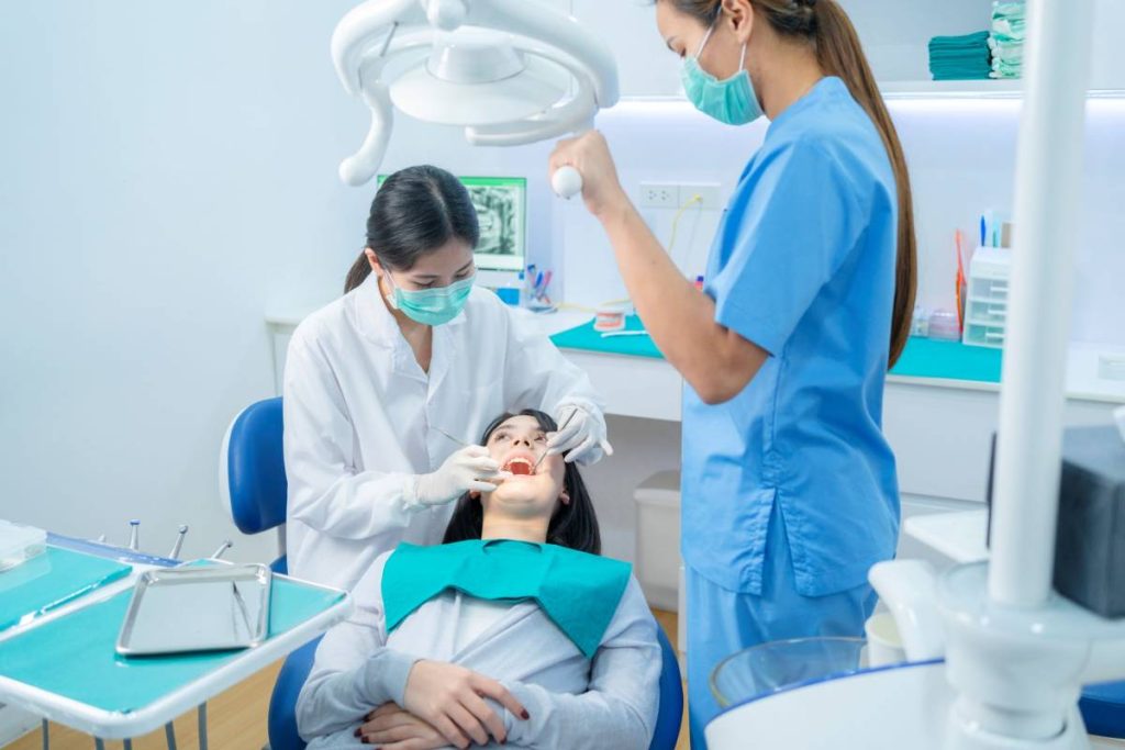 Dentist placing a dental filling
