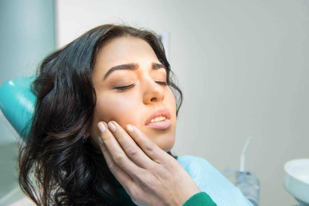 Woman Suffering from Wisdom Toothpain